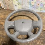 02-09 DODGE RAM COMPLETE STEERING WHEEL WITH CRUISE VOLUME CONTROLS
