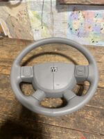 02-09 DODGE RAM COMPLETE STEERING WHEEL WITH CRUISE VOLUME CONTROLS